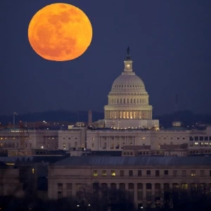 Night moon over Washington DC and Capitol.