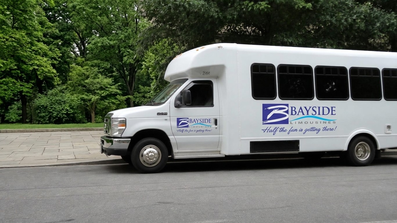 Bayside Limousines shuttle bus ready for wedding guest transportation at a Maryland waterfront venue