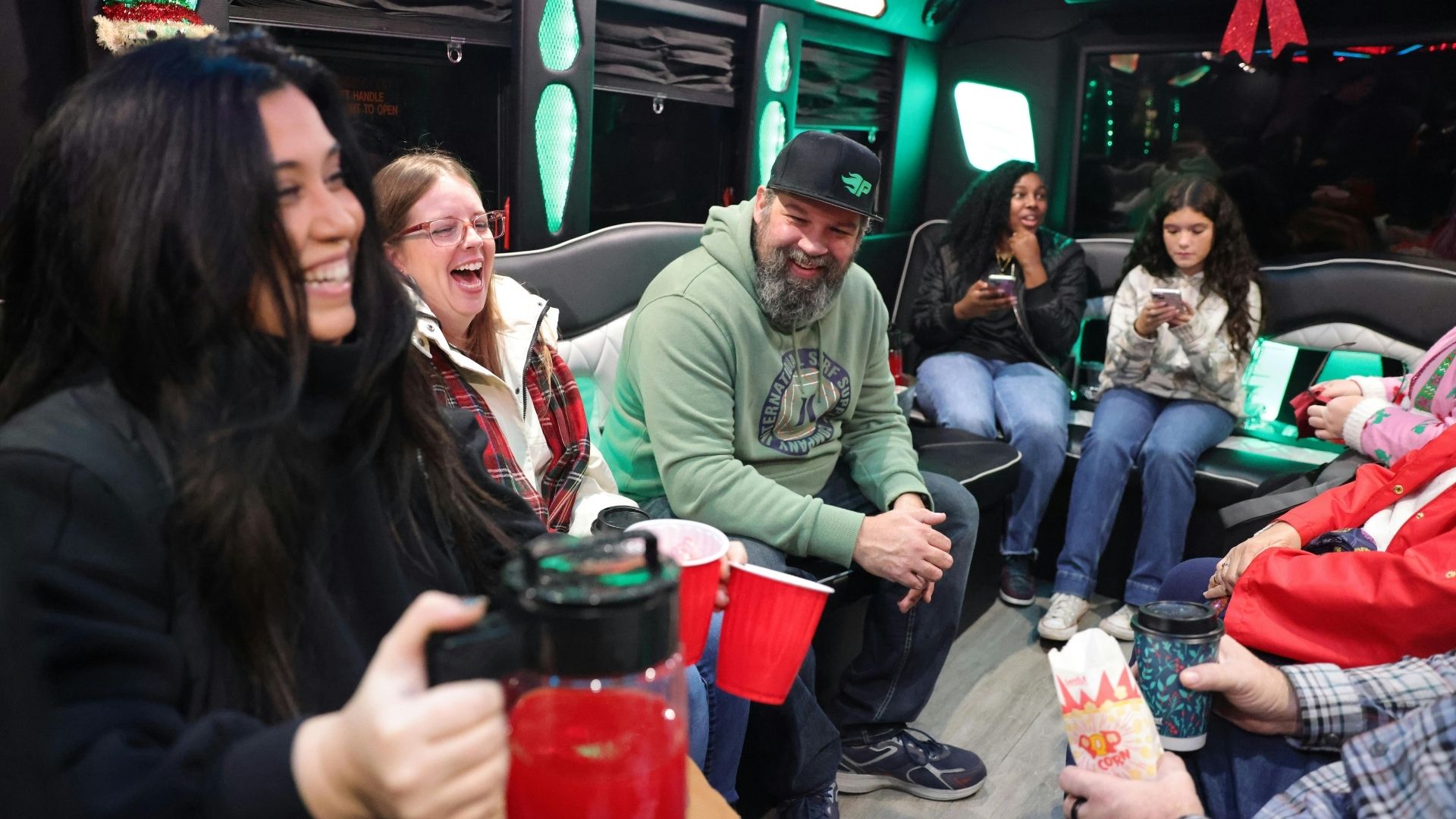 Party bus baltimore md and stretch limo parked side by side comparison