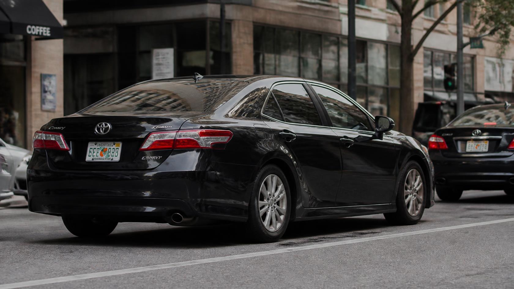 Bayside Limousines black sedan in the city for a pre-booked BWI to DC transfer