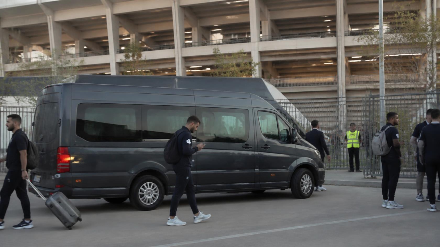 Bayside Limousines Sprinter van beside Maryland's football stadium in College Park on game day