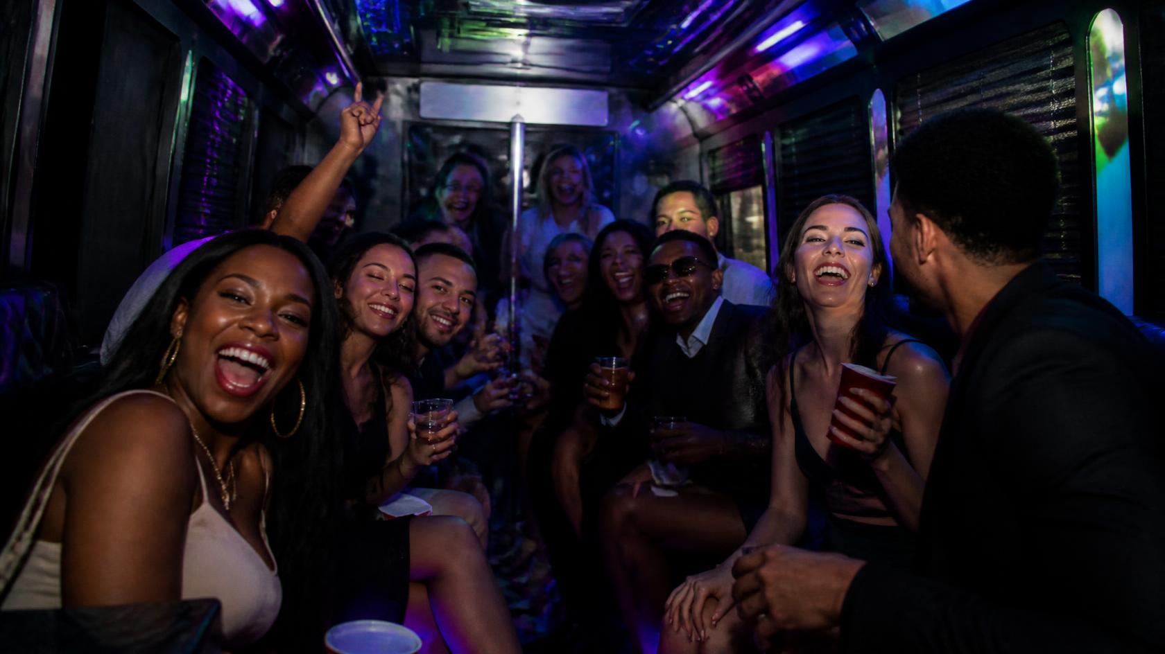 Party bus interior with seating and lighting for a group celebration