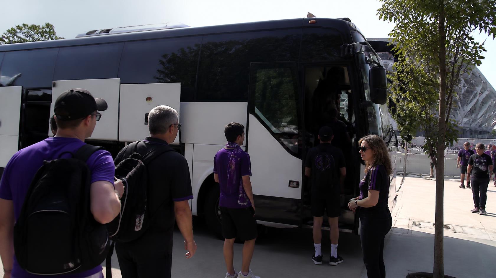 Group of Terrapins fans arriving together by shuttle for a Maryland football game at SECU Stadium